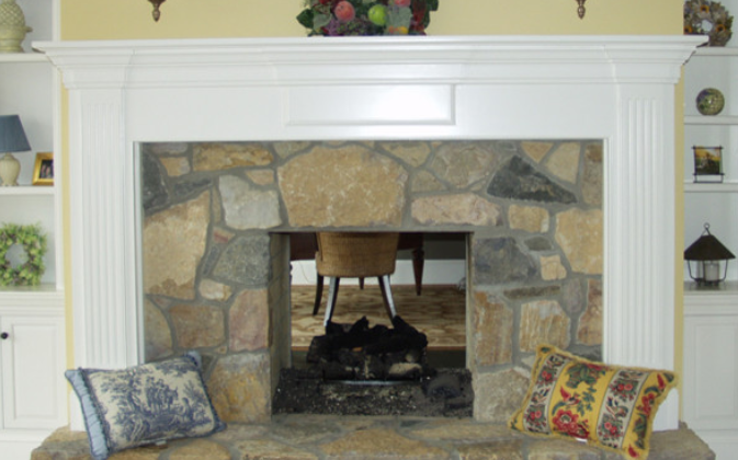 Handcrafted wood fireplace mantel and surround by Flegel Woodcraft